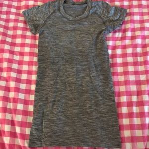 A grey lululemon workout shirt
